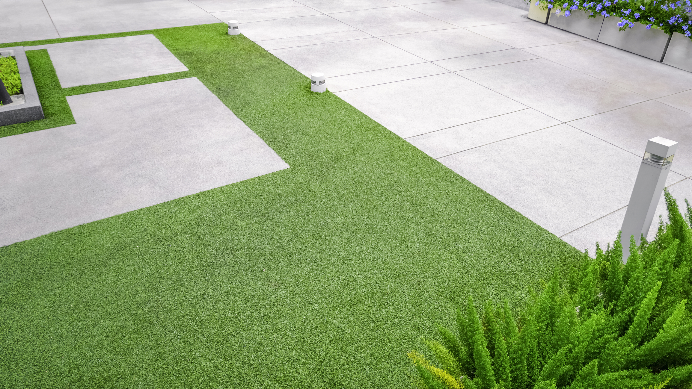 Artificial turf with gravel stone pavement for can-you-install-artificial-turf-on-concrete blog.